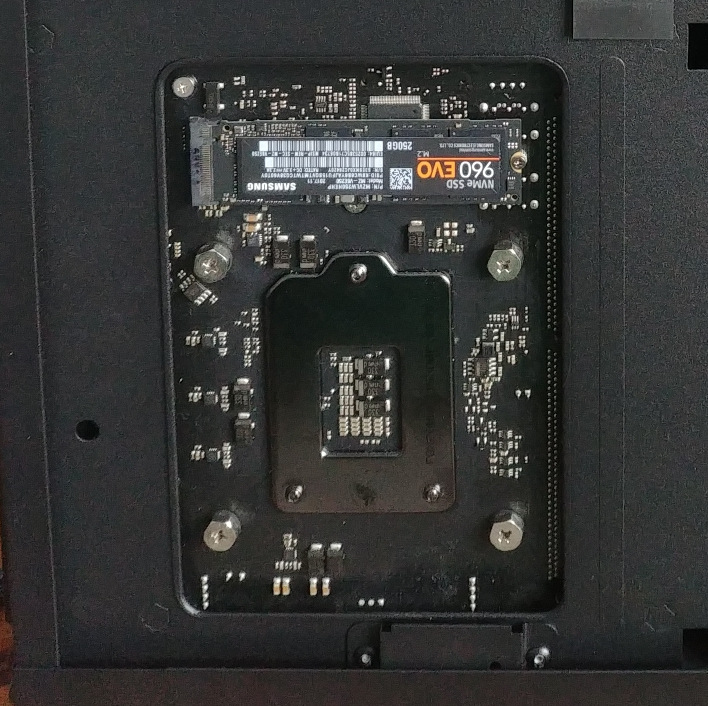 The heatsink is held on with 4 individual bolts through the board, and no backplate